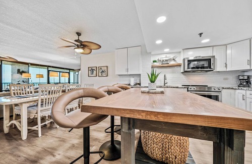 New Smyrna Beach Condo | Updated direct oceanfront condo with large private balcony and a beachfront pool