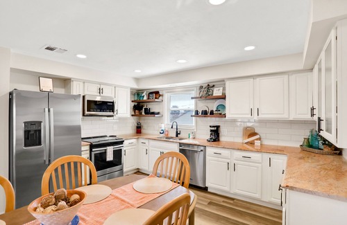 Flagler Beach House | Updated home across from beach with covered balcony, central AC, & washer/dryer