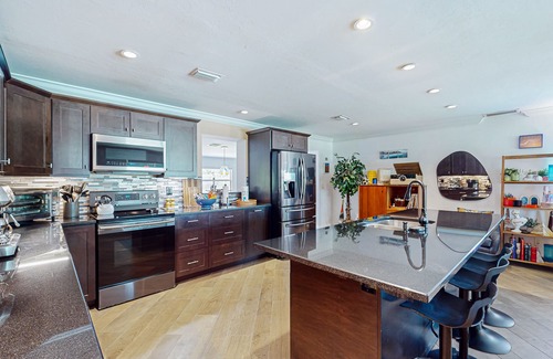 East Naples House | Updated home near beach/golf with private yard, firepit, & home office