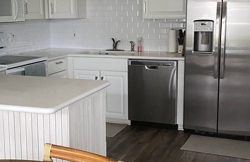 New Smyrna Beach Condo | Updated large Beachfront townhome 4 bedrooms, 3.5 baths + loft.