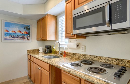 Belleair Beach Condo | Updated! On the Beach! Pets Allowed, Pool, Parking, Free Activities! ~ 201 Bellair Beach Club