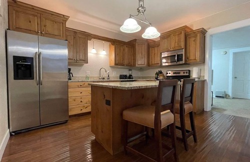 Sugar House Condo | Updated partially subterranean apartment.