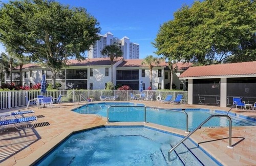 Pelican Bay Condo | Updated Pelican Bay Condo Near Beach and Overlooking Pool/Tropical Gardens.