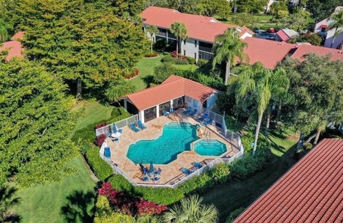 Pelican Bay Condo | Updated Pelican Bay Condo Near Beach and Overlooking Pool/Tropical Gardens.