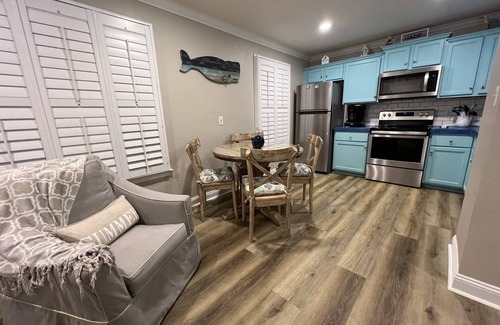 Gulf Shores Condo | Updated & pet friendly. Short stroll to west beach. Located at crosswalk.