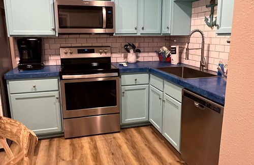 Gulf Shores Condo | Updated & pet friendly. Short stroll to west beach. Located at crosswalk.