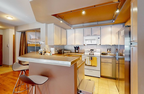 Mammoth Lakes House | Updated townhome with a fireplace, grill, pool, hot tub - easy access to slopes