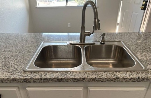 Roosevelt House | Upper level unit with one bedroom and one bathroom and fresh interior paint