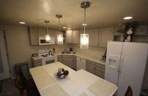 West Jordan House | Upscale 2-bedroom with onsite parking.