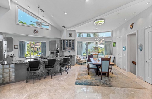 Whitney Beach House | Upscale Canal Home – Private Pool & Boat Dock: Hideaway Bay in LBK by RVA