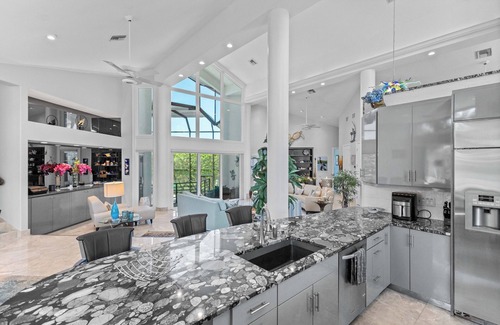 Whitney Beach House | Upscale Canal Home – Private Pool & Boat Dock: Hideaway Bay in LBK by RVA