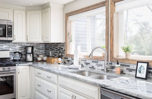 Traverse City House | Upscale Modern Oasis: Spacious & Chic with Hot Tub!