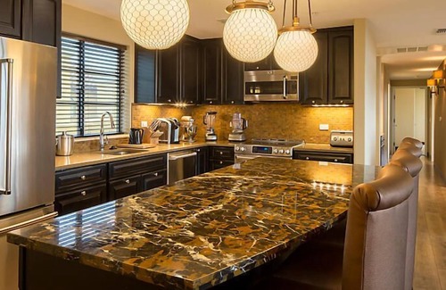Cibola Vista Resort | UpScale Resort with Outdoor Heated Pool with a waterslide and a poolside bar, tennis court and gym