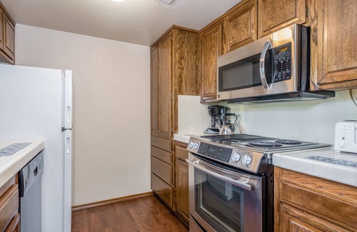 West Beach House | Upscale West beach townhome with solar heated pool