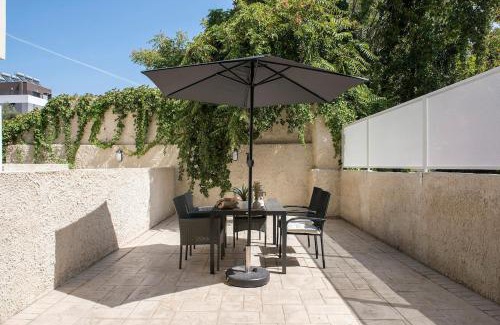 San Lorenzo Apartment | Urban Oasis near Termini, free Parking&Patio, int3