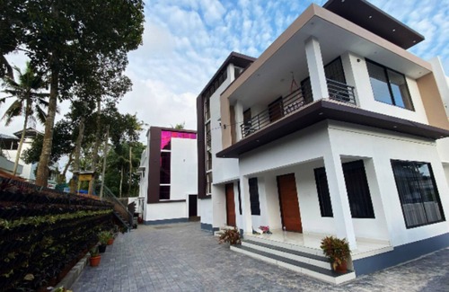 Nedumangad Apartment | Urbane Cove 1: Furnished AC Apt