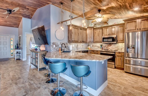 Matlacha Isles Villa | Fun'n Sun-Charming 3 BR/3 baths waterfront villa- pool, spa, dock, fishing poles