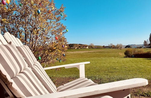 Middelhagen House | Vacation home with water view, large garden, 4 bedrooms, 2 bathrooms, sauna, fireplace