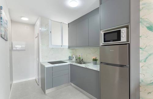 Playa del Ingles Apartment | Vacation Apartment 'Kellys' Bayuca' with Shared Pool, Wi-Fi and Air Conditioning
