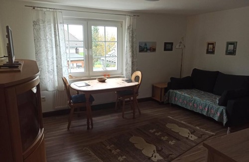 Kuerten Apartment | Vacation apartment Biesfeld-Altes Backhaus