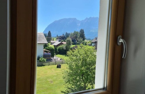 Bad Mitterndorf Apartment | Vacation apartment Enzian (70 m2), parking, WLAN, large garden, playground