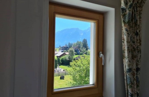 Bad Mitterndorf Apartment | Vacation apartment Enzian (70 m2), parking, WLAN, large garden, playground