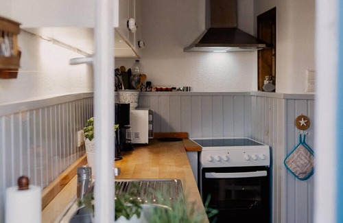 Schleswig Apartment | Vacation apartment "Fischerhuus Schleswig" - only 100 meters from the water