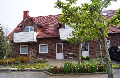 Werdum Apartment | Vacation apartment no.: 2 Fireplace - Haus Friesentraum