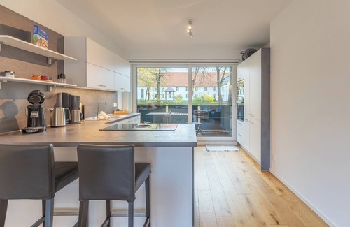 Zentrum Apartment | Vacation apartment "Theos Garten" in Husum for up to 4 people