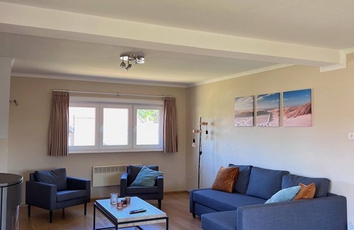 De Haan Apartment | Vacation apartment with garden 1.5 km from the sea.
