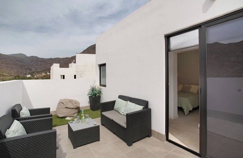 Mogan Apartment | Vacation 'Dreaming Penthouse Mogan' with Mountain View, Wi-Fi and Air Conditioning
