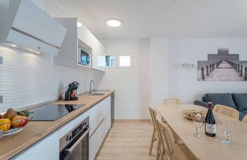 Tabaiba Apartment | Vacation 'La Bahia' with breathtaking mountain and sea views from the terrace