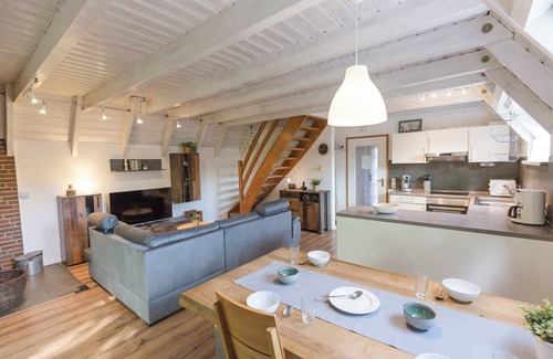 Dorumer Neufeld House | Vacation home Opi Huck Stroot 42 with a beautiful garden and close to the beach.
