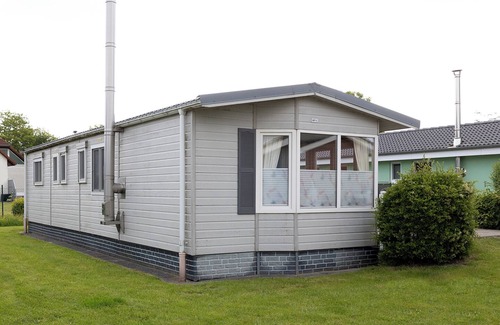 Dorumer Neufeld House | Vacation home to the seahorse. Flooded with light and at ground level.
