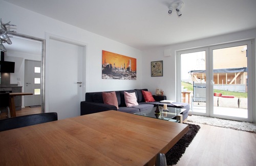 Ludwigshafen Apartment | Vacation happiness. Modern vacation apartment with private garden