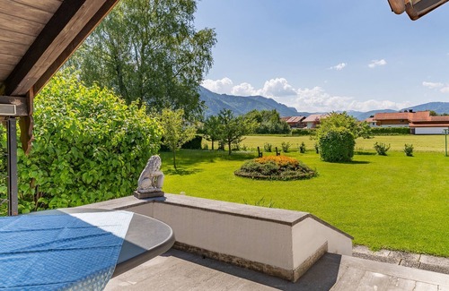 Grassau Apartment | Vacation home 45 sqm, for 2 pers., bedroom, living room, kitchen, south-facing terrace, large balcony. Sunbathing lawn, quiet location with mountain views.
