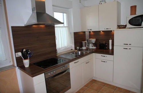 Glowe House | Vacation home directly on a white beach with a path from the house to the sea