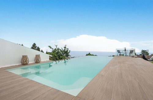 Santa Barbara House | Vacation Home "Casa Adayeim 2" with Mountain View, Sea View, Shared Pool, Wi-Fi, Terrace & Garden