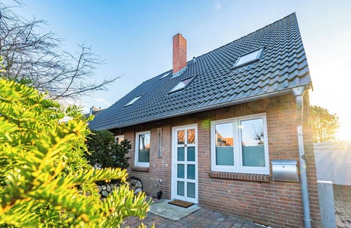 Tinnum House | Vacation home in Tinnum with fireplace and terrace.