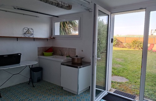 Plouescat House | Vacation home in Plouescat, sea view, feet in the water.