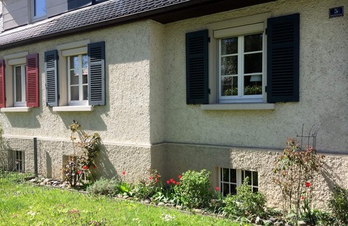 Reutin House | Vacation home Köchlin - charming semi-detached house with garden and parking space