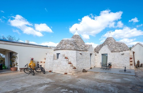 Martina Franca House | Vacation Home "La Valle dei Trulli" with Private Garden, Whirlpool & Wi-Fi