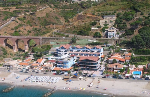 Province of Messina House | Vacation Home "Oasi Azzurra - Trilocale Plus 1" with Sea View, Shared Pool & Shared Terraces