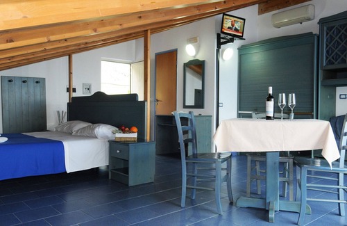 Province of Messina House | Vacation Home "Oasi Azzurra - Monolocale Standard 1" with Shared Pool & Shared Terraces