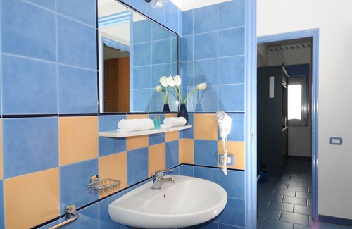 Province of Messina House | Vacation Home "Oasi Azzurra - Monolocale Standard 2" with Shared Pool & Shared Terrace