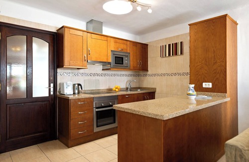 Playa Blanca Apartment | Vacation Home 'Puerto Chico B' with Sea View, Shared Pool & Wi-Fi