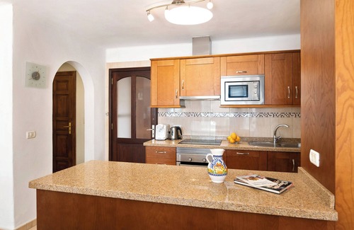 Playa Blanca Apartment | Vacation Home 'Puerto Chico B' with Sea View, Shared Pool & Wi-Fi