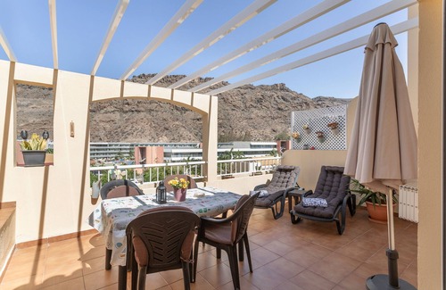 Puerto de Mogan Apartment | Vacation 'Los Mangueros Beach 37 - Mogán' with Mountain View, Wi-Fi and Air Conditioning