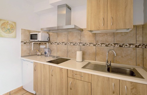Moya Apartment | Vacation 'Montemar 1' with Sea View, Shared Pool and Wi-Fi
