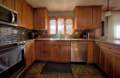 Grove City Cottage | Vacation Oasis : Pet Friendly : Enclosed Porch w/ Fire Pit